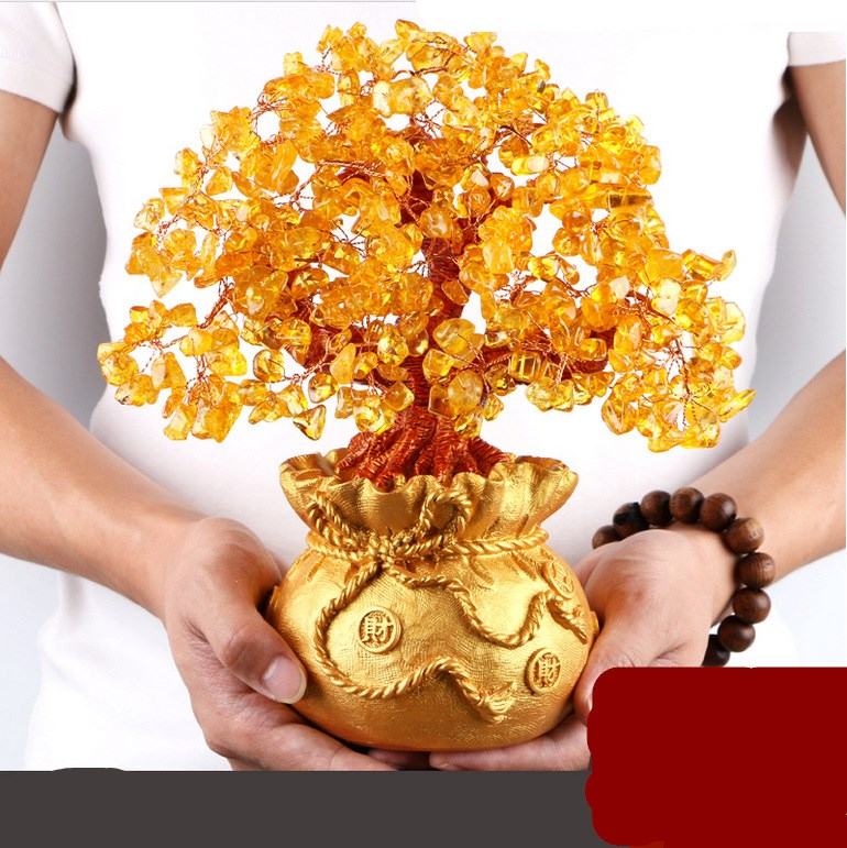 Small natural crystal lucky tree made of citrine for decoration and gift