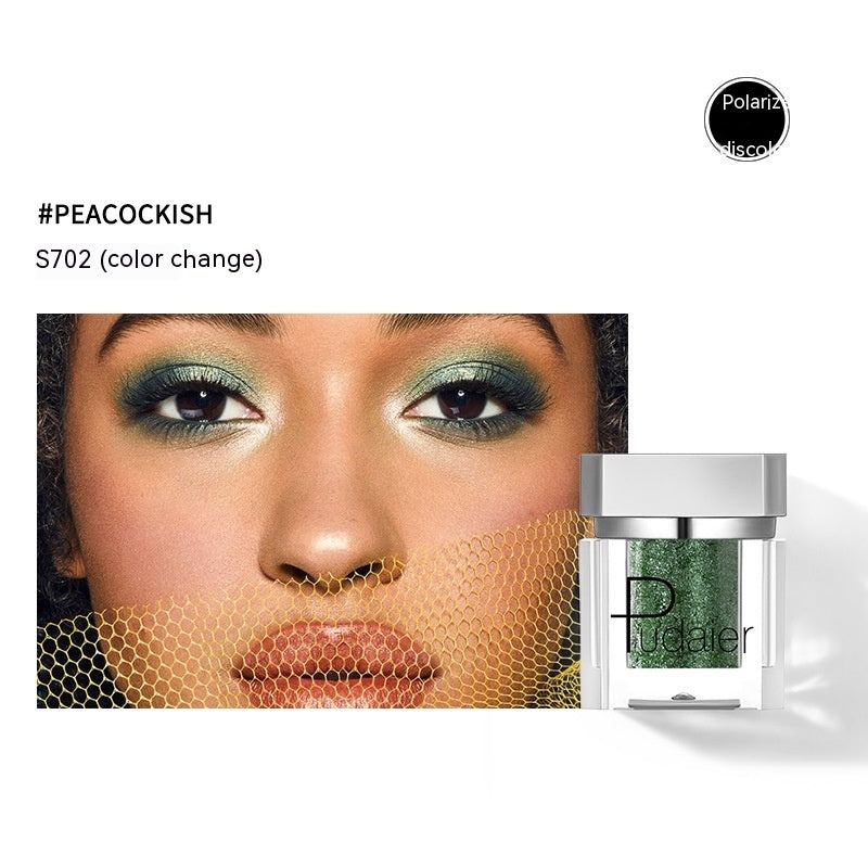 Makeup product with green color change effect and model wearing green eyeshadow.