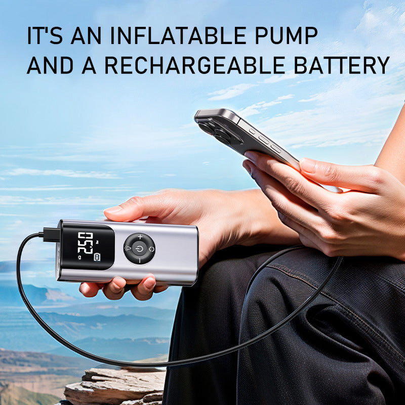 Inflatable pump with rechargeable battery held by a person with a phone, outdoor setting.