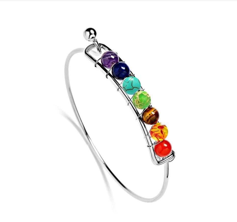 Rainbow chakra bracelet with copper accents for spiritual wellness and balance