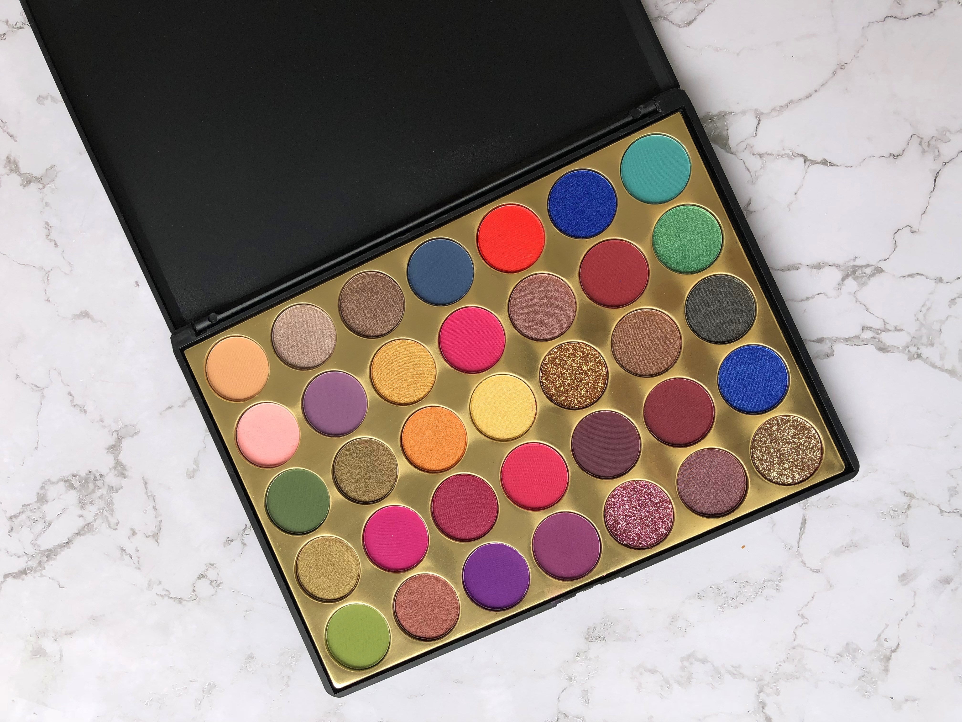 Close-up of glitter powder glitter eyeshadow palette with shimmering shades for sparkling eye makeup