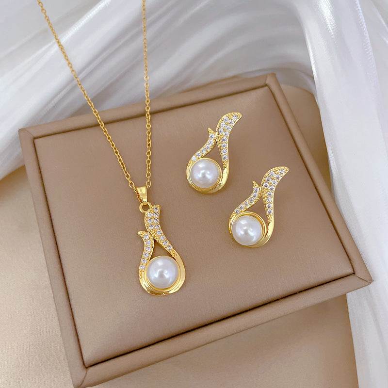 Light luxury necklace and earrings suite with full diamond pearls and geometric universe design in Korean style