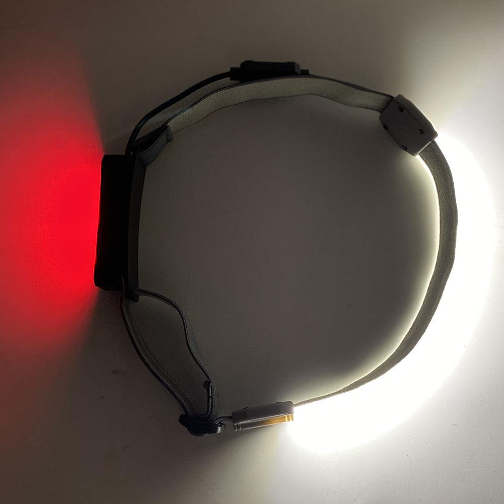 USB rechargeable COB headlight with red warning light and 300-lumen floodlight for hands-free safety and visibility