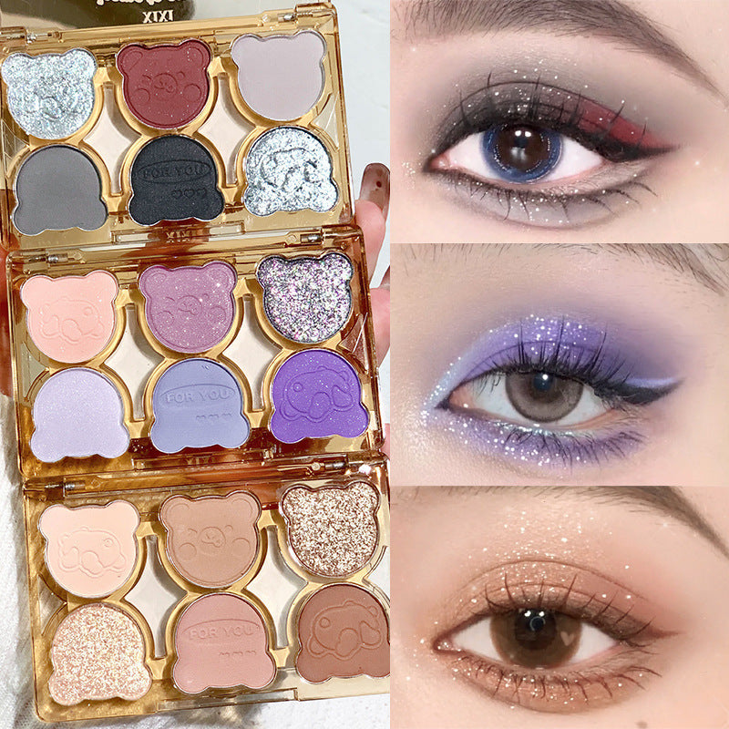Six color eyeshadow palette with white, pink, brown, and blue shades for universal skin tones