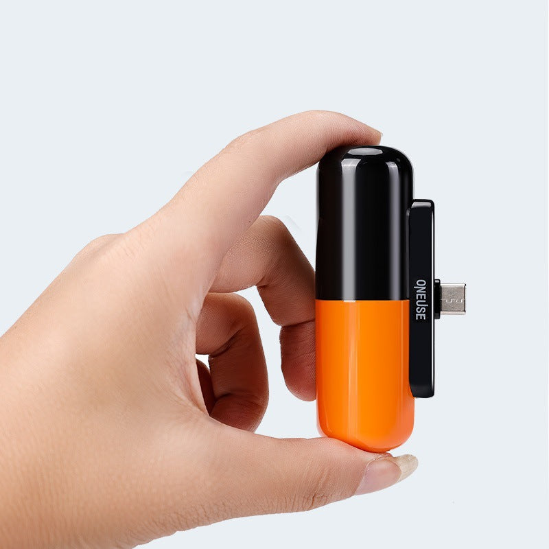 Capsule Android Portable 5000mAh power bank with LED flashlight in orange, pink, and blue colors