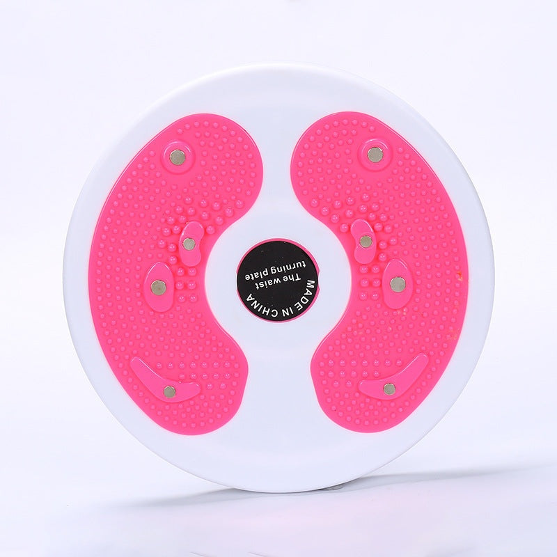 Pink and white exercise disc on a light gray background